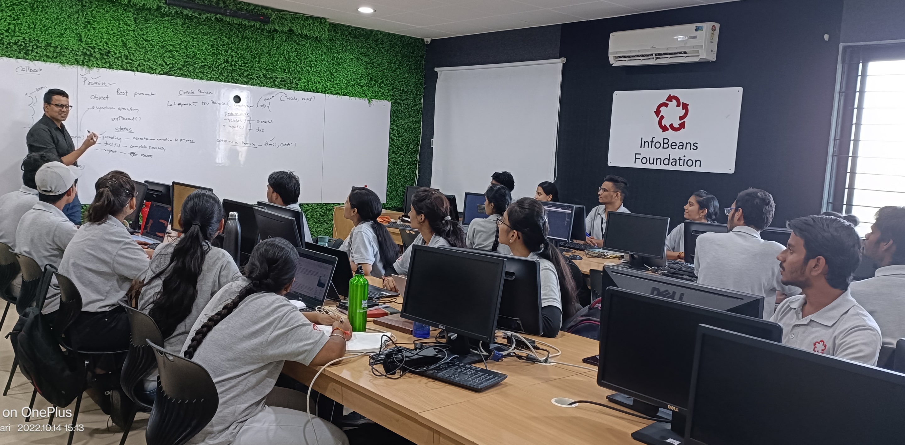 ITEP photograph of the training center with a room full of students